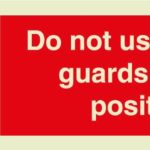 Do not use unless guards are in position sign